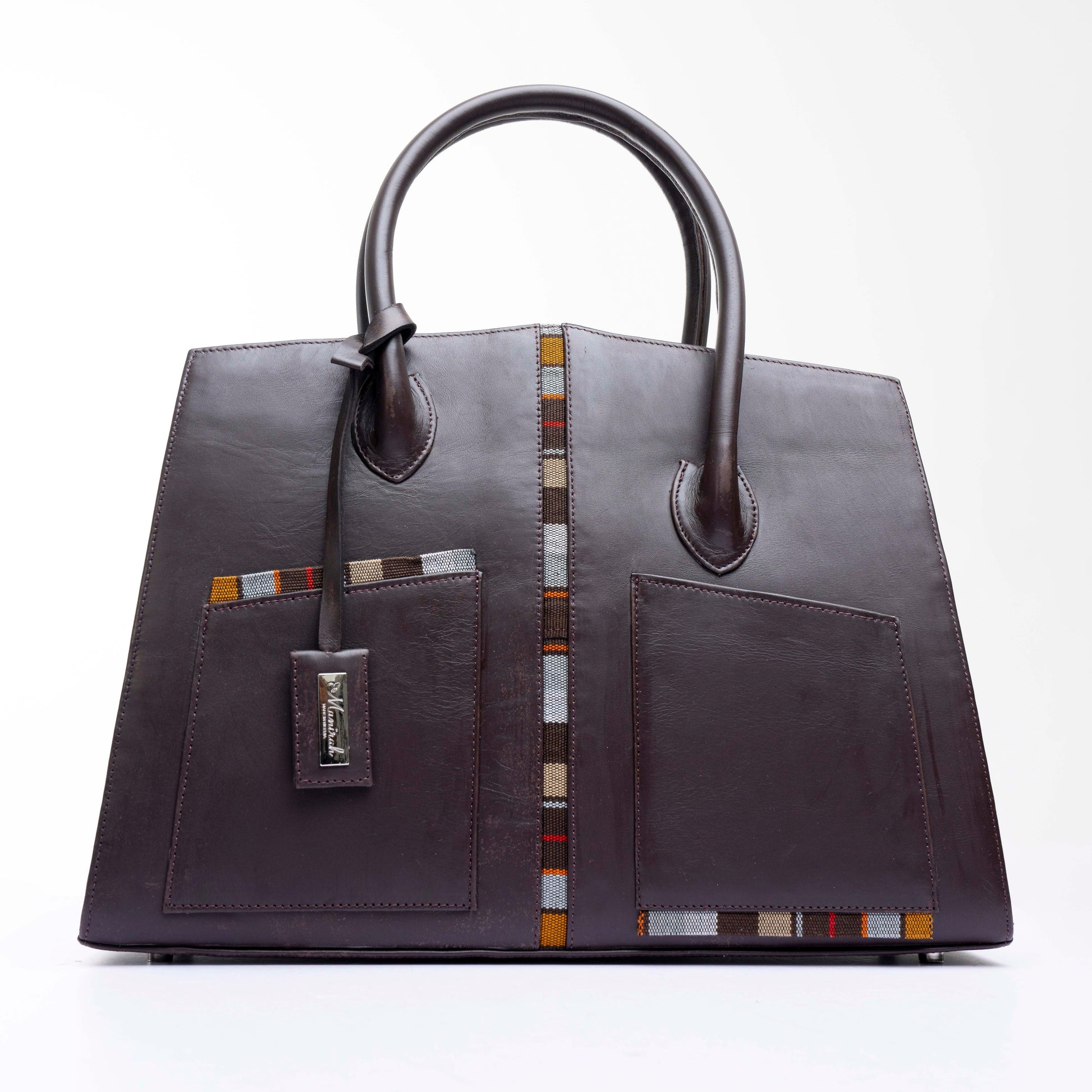 Brown leather handbag with decorative stitching on a white background. Made with Leather and Asooke